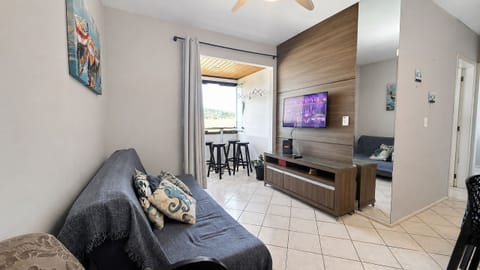 Family Apartment | Living area | 40-inch flat-screen TV with digital channels, TV, Netflix
