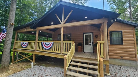 Honey Bear Cabin has a welcoming oversized wrap around deck.