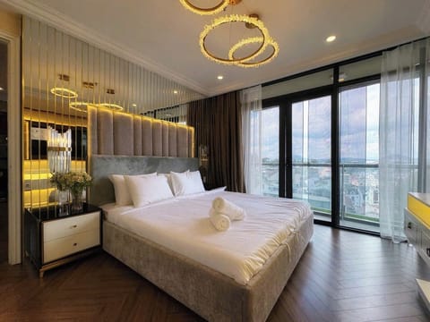 Luxury Apartment, 3 Bedrooms, City View | Desk, laptop workspace, blackout drapes, soundproofing