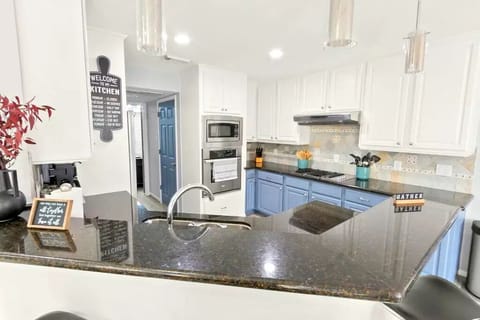 Prepare meals and connect in a family-friendly kitchen that offers comfort and ease.