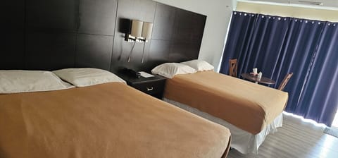 Comfort Room, 2 Double Beds, Non Smoking | In-room safe, desk, free WiFi, bed sheets