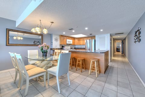 Gather around your spacious dining table for memorable meals, then chat at the breakfast bar while coffee brews in your fully-equipped kitchen.