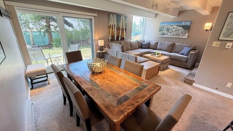Dining Table and Walk Out to Patio with Views to Vail Mountain