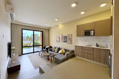 Basic Apartment | Living area | 55-inch Smart TV with cable channels