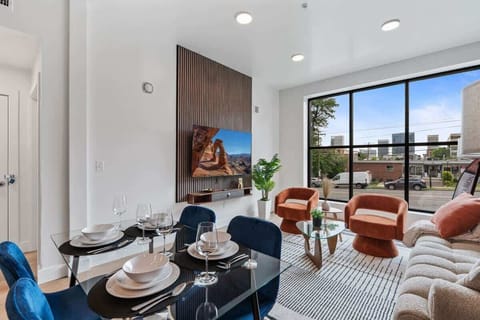 Dine in comfort at a chic four-person dining area just steps from the kitchen.