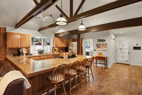 Fully  equipped kitchen with top-of-the-line appliances and ample counter space