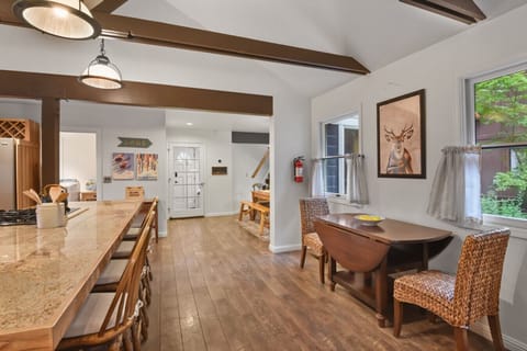 Expandable dining table + barstools on the kitchen counter