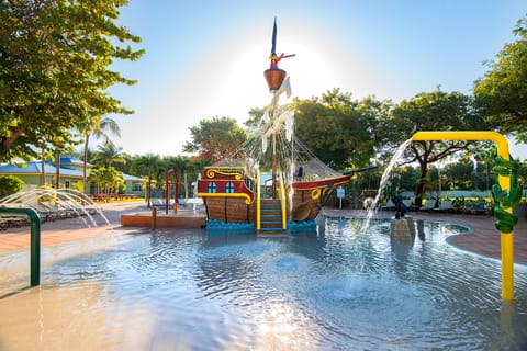 Adventure awaits on the whimsical pirate ship, where laughter reigns and childhood dreams come alive, making unforgettable memories under the golden sun.