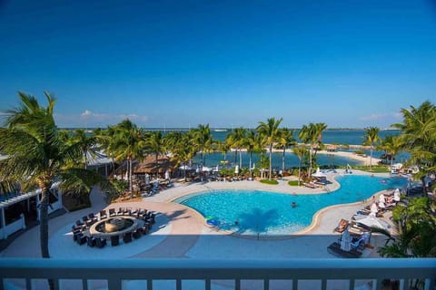 With thoughtfully designed space and a private balcony overlooking the pool and island waterway, this peaceful retreat is perfect for two guests seeking a laid-back island experience.