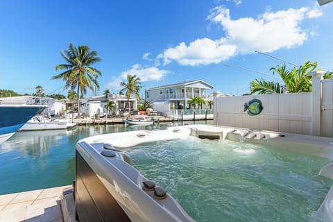 Covered Spa on side of home