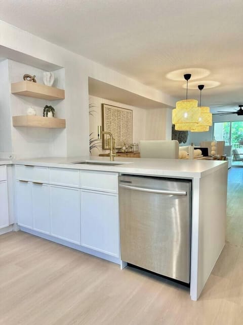 Sleek design with a view into the open living space and a dishwasher to make cleanup a breeze.