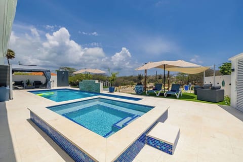Escape to serenity! Our crystal-clear pool offers the perfect spot for a refreshing swim, a peaceful float, or simply relaxing by the water’s edge in pure bliss.