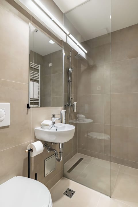 Shower, free toiletries, hair dryer, bathrobes