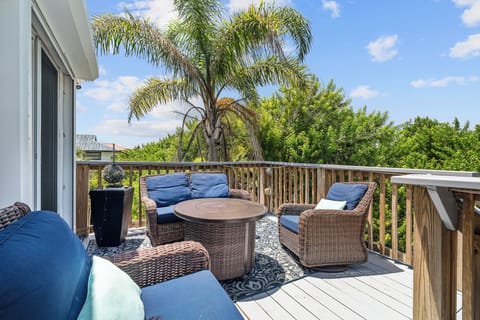 Relax on the raised 2nd floor back deck with the glass bead fire pit.