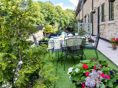 Furniture, Outdoor Furniture, Chair, Table, Garden, Outdoor Table, Shrub, Backyard, Flagstone, Patio