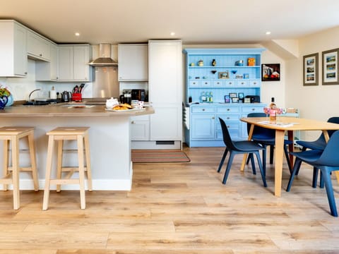 Furniture, Interior Design, Flooring, Floor, Wood Flooring, Wood, Chair, Countertop, Kitchen, Table