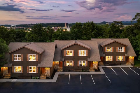 Charming cabin-style rentals with mountain views and stunning sunset backdrops!