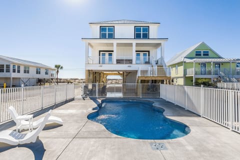 Brand new construction 6 bedroom 4 bathroom with heated pool and game room located 50 steps from the beach.
