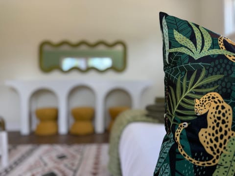 Spacious living room with large TV—perfect for relaxing and movie nights