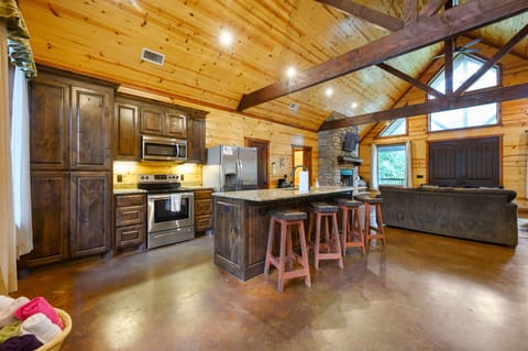 Sip morning coffee or grab a bite at the kitchen counter, seating 4