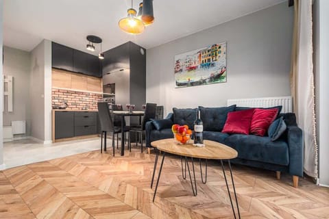 Living room with a comfortable sofa and TV. 