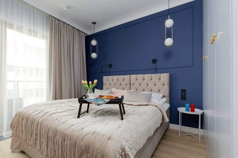Studio with a double bed (can be separated) and wardrobe.
