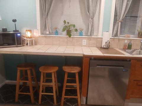 Enjoy the eating nook with stools.