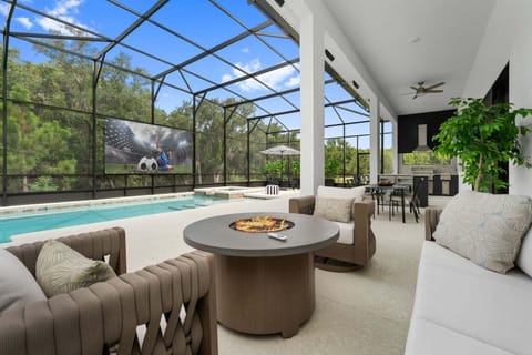 Enjoy our outdoor oasis featuring an alfresco dining area, outdoor kitchen with BBQ grill, cozy fire pit and private pool perfect for unforgettable evenings!