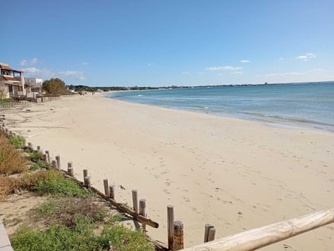 On the beach, white sand