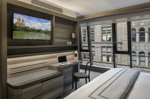 Premium bedding, down comforters, in-room safe, desk