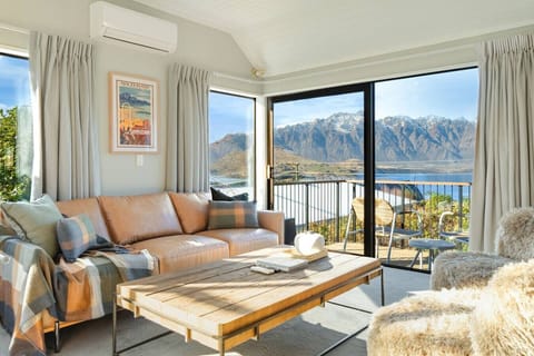 Wake up to jaw-dropping lake and mountain views right from the open plan living area