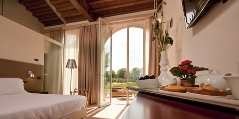 Junior Triple Room, Private Bathroom, Garden View | Premium bedding, in-room safe, desk, laptop workspace