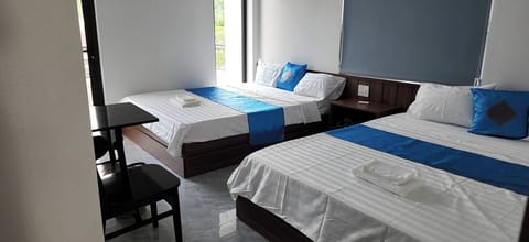 Basic Quadruple Room, City View | Free WiFi