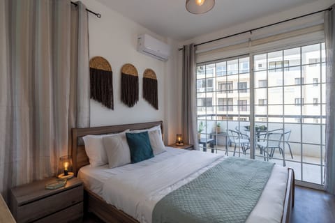Apartment, 2 Bedrooms, Kitchen, City View | Blackout drapes, iron/ironing board, WiFi (free), individually decorated
