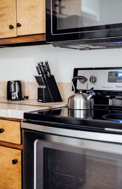 The kitchen features ample counter space, oven and almost everything you need for cooking