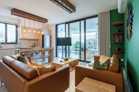 Apartment, 2 Bedrooms, Kitchen, City View | Living room | 55-inch Smart TV with digital channels