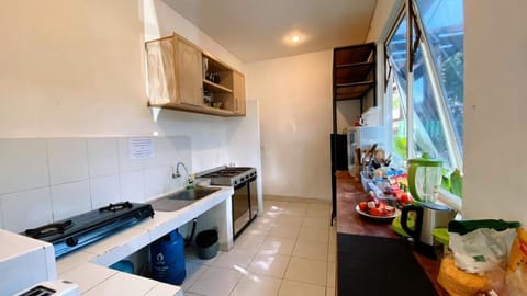 Mini-fridge, microwave, stovetop, cookware/dishes/utensils