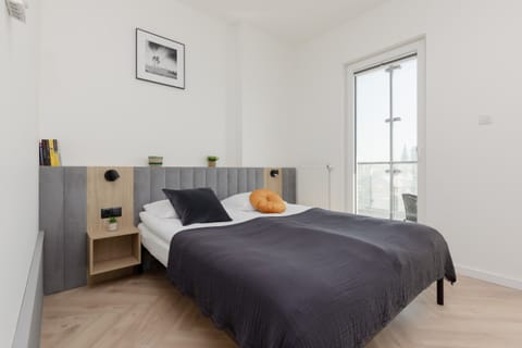 Living area with double bed.