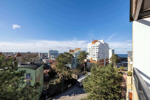 The view from the balcony overlooks the beautiful surroundings of the property.