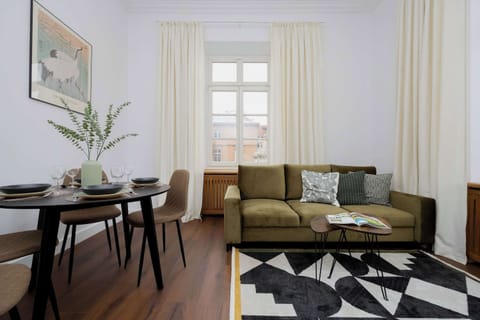 Living room with a comfortable sofa and TV. 