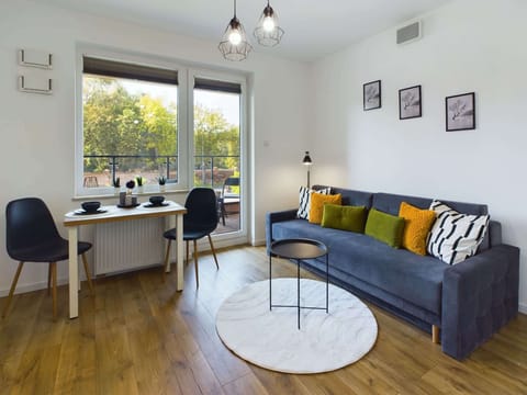 Living room with a comfortable sofa and TV.