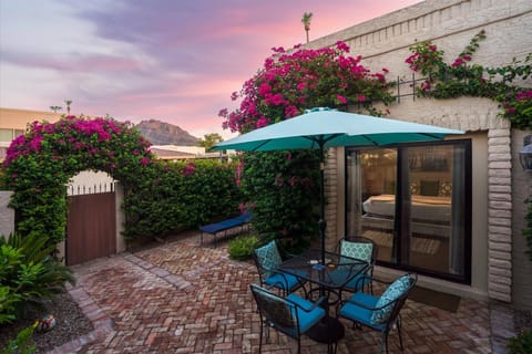 Desert Serenity Awaits! Relax in the private front courtyard, surrounded by lush desert landscaping—the perfect spot for morning coffee, quiet afternoons, or peaceful evening chats. 