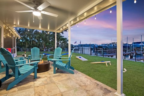 Unwind by the fire pit with water views—perfect for sunsets and stargazing.