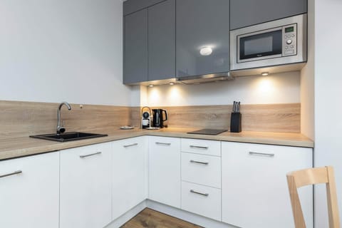 Kitchenette with microwave.