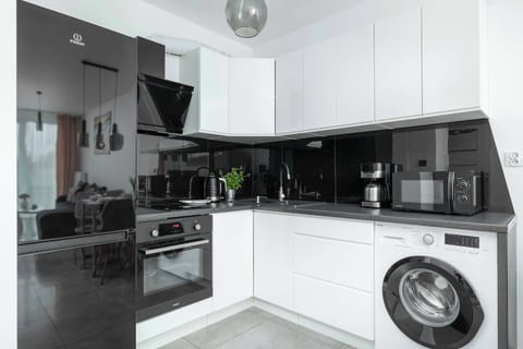 The fully equipped kitchenette includes everything you need for a home-cooked meal.