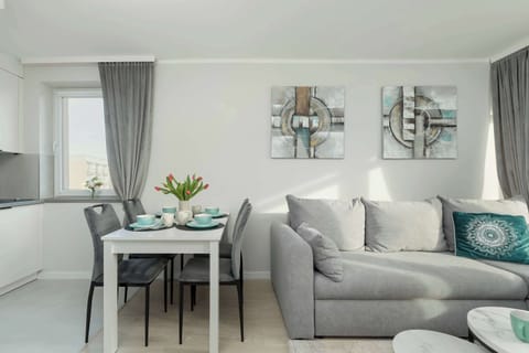 Bright living room with comfortable seating and elegant décor – Relax in a cozy, stylish environment.