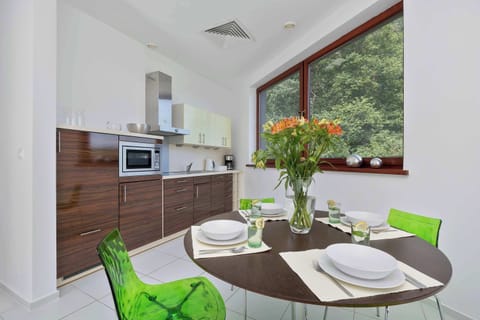 Bright dining nook by the window – perfect for morning coffee.

