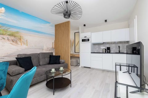 The living room's beautiful design complemented by natural light streaming in.