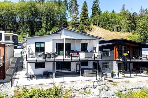 Exterior of Cowichan Lake Escape, a walkout suite just a few minutes` walk to the private beach & marina.