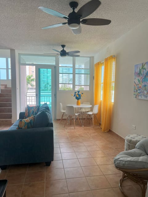 Bright, colorful and cozy living room with balcony.